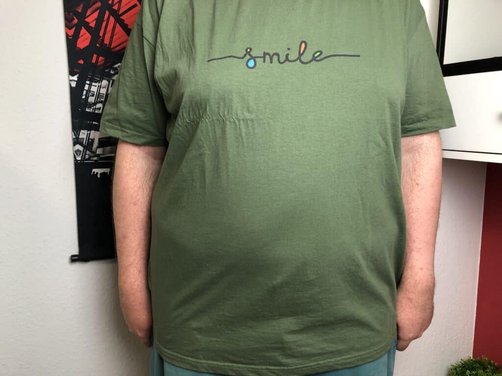 Das Herren T-Shirt Smile von Kate Emmadee