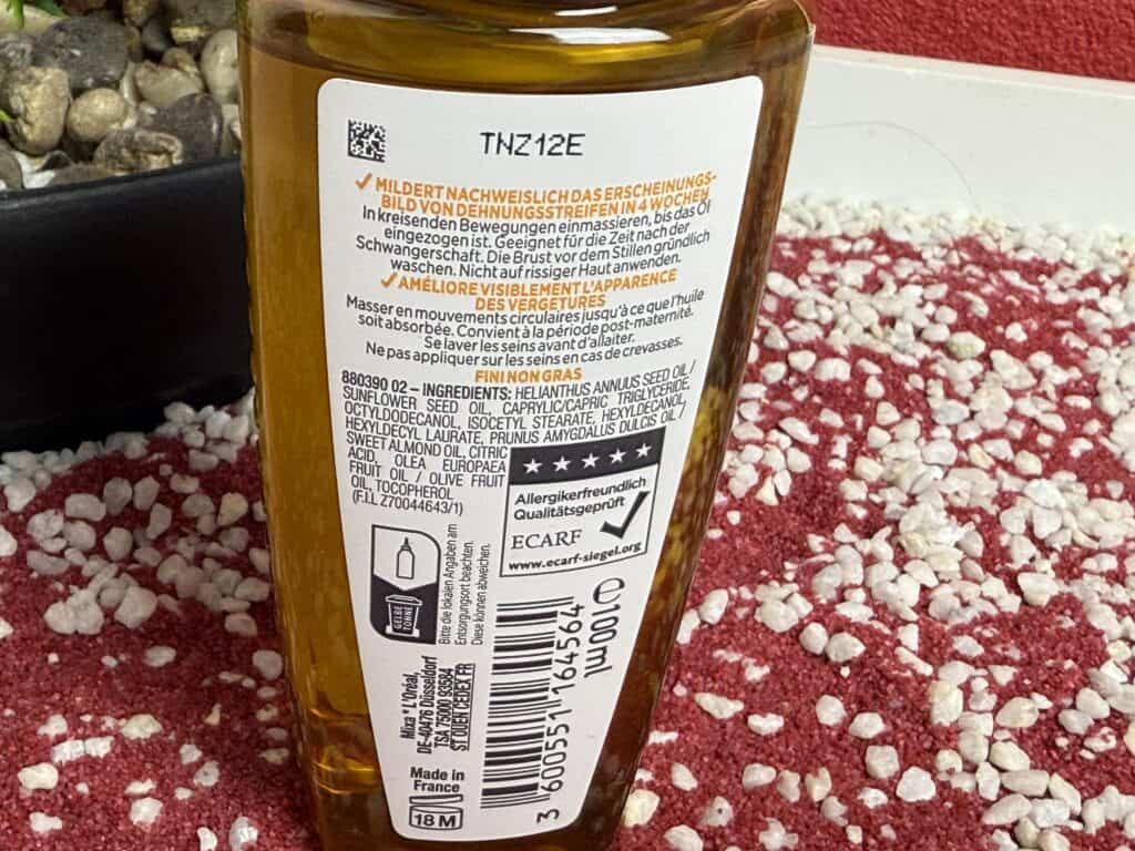 Einige Informationen auf der Flasche des Mixa Stretch Mark Oils
