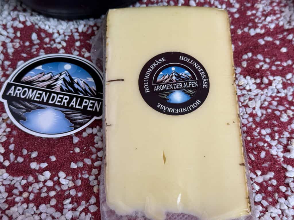 Aromen der Alpen Käse, der Holunderkäse