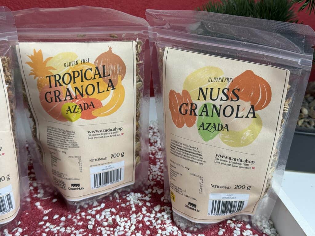 Das Azada Granola in den Sorten Nuss und Tropical