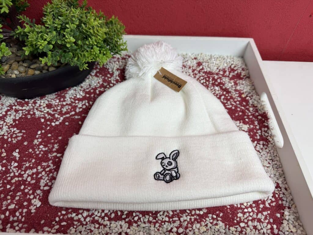 Die Fake Rabbit Bommelmütze